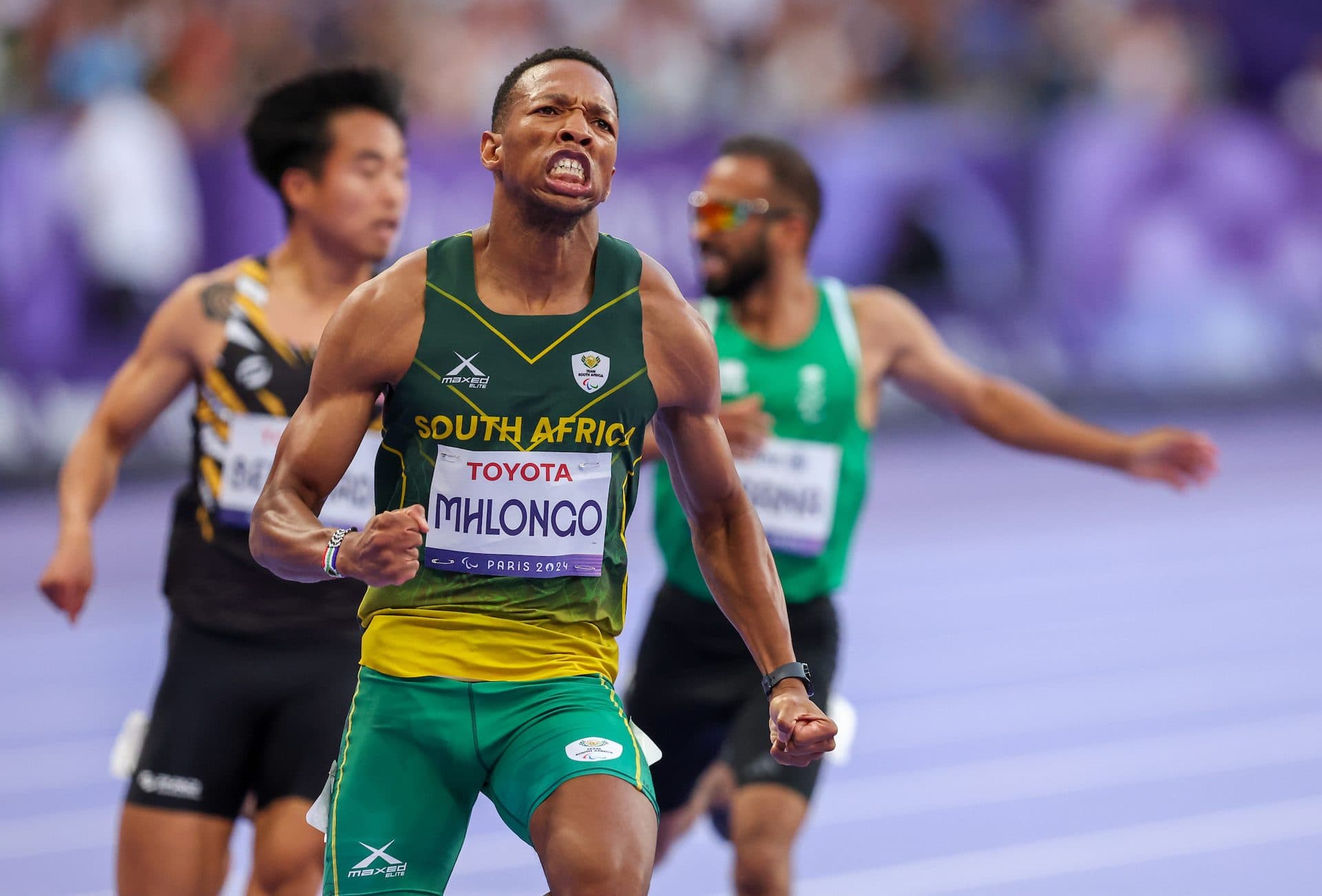 Mpumelelo Mhlongo celebrates winning gold at the Paris 2024 Paralympic Games